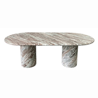 Table à manger ovale en marbre naturel de luxe moderne avec piétement cannelé pour villa, salon, hôtel