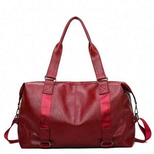 Muestra gratuita de bolso de viaje de cuero grande para mujer, con diseño nuevo, moderno, personalizado e impreso. - Product Image 1