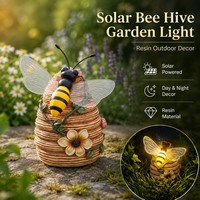 Neuheiten OEM ODM Harz-Bienenstock Gartendekoration Outdoor-Wabenskulptur mit solarbetriebener Akzent-Biene