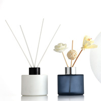 Vente en gros de flacons diffuseurs à roseaux ronds vides de luxe contenants diffuseurs à roseaux décoratifs 100ml 200ml flacons diffuseurs noirs avec roseaux