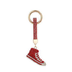 LLavero con abalorio de zapatilla de deporte con diamantes de imitación, cadena con incrustaciones de cristal, bolso de lona para mujer, llavero colgante de regalo de recuerdo - Product Image 1