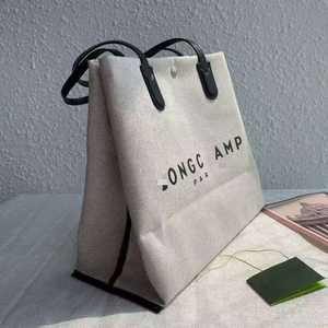 2026 Frankrijk Merk Lange-rits Groothandel Handtas Grote Capaciteit Canvas Emmersak Dumpling Commuter Schoudertas voor Dames - Product Image 3