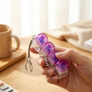 Juguete Antiestrés de Plástico No Tóxico con Cuatro Botones, Llavero Mecánico con Tapa Rectangular Transparente, Alivio del Estrés para Adultos y Jóvenes - Product Image 1