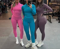 Ensemble de sport 2 pièces sans couture pour femme avec fermeture éclair 1/4, veste à manches longues et leggings froncés pour le yoga – Collection OEM usine