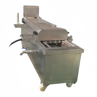 Friteuse industrielle continue pour nuggets de poulet, galettes de viande, frites, boulettes de viande, transformation d'aliments et de snacks