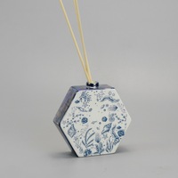 Diffuseur de parfum en céramique en gros, bouteille blanche émaillée motif coquillage, ensemble d'aromathérapie pour la maison avec bâtonnets en rotin, OEM