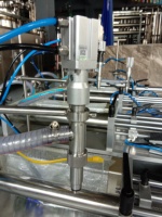 Machine de remplissage horizontale semi-automatique, à buses simples ou double, pour le remplissage de liquides pneumatiques, pour saucisses