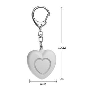 Alarma de seguridad personal para mujeres-Sirena fuerte 125DB para ahuyentar a los atacantes y ayuda de alerta. Llavero compacto y fácil de usar - Product Image 1