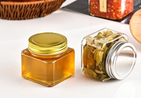 Verre clair vide de luxe 250ml 380ml 500ml unique de qualité alimentaire avec bouchon à vis Sauce chaude confiture miel bouteille pot pour le stockage des aliments
