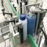 JPacks Machine à étiqueter automatique à grande vitesse et rapide pour petites bouteilles Oral liquide Machine à étiqueter les étiquettes autocollantes