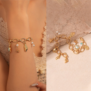 Pulsera de moda de aleación antigua de alta calidad al por mayor para Europa Estados Unidos Fishtail Marine Holiday Wind Drop Oil Pearl Pendant - Product Image 4