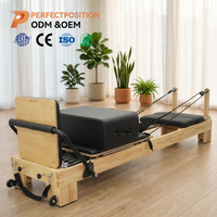 Machine de Pilates Reformer en bois de chêne commercial pour l'entraînement professionnel en studio, avec chariot fluide, fournisseur OEM de logos personnalisés