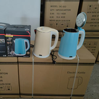 Bouilloire électrique portative de base de rotation de l'acier inoxydable 2.3L de haute qualité en plastique de 360 degrés pour le ménage de voyage d'hôtel
