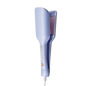 2025 New Hot Selling <b>Mini</b> Egg Roll Ceramic Electric Hair Curler PTC <b>Heater</b> with LED Temperature Display - Product Image 1