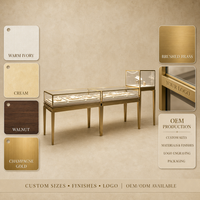 Ensemble de vitrine de présentation de bijoux commerciaux, cadre en métal couleur laiton, table de présentation en verre avec éclairage LED pour bijouterie