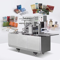 Machines d'emballage automatiques en film plastique BOPP PE 3D pour aliments, préservatifs, parfums, cosmétiques, sachets de thé, savons, masques, boîtes