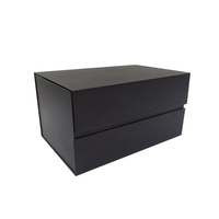 Boîte cadeau noire élégante avec insert en mousse, couvercle magnétique mat, pour l'emballage d'un ensemble de soins de la peau