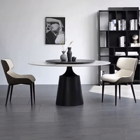 Leichter runder Luxus-Tisch aus Kohlenstoffs tahl mit minimalisti schem, modernem Haushalts-Esstisch mit kleinem High-End-Rock-Teller