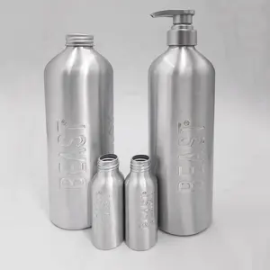 定制冲压压花标志铝化妆瓶，带乳液泵用于洗发水、压花护发素