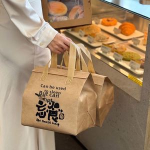 Bolsa de tela no tejida gruesa y portátil con aislamiento térmico sellado con papel de aluminio desechable de grado alimenticio para pastel de leche - Product Image 1