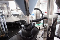 Ligne de remplissage rotative haute vitesse pour poudres, machine de remplissage automatique de poudres, équipement de dosage et de remplissage