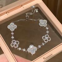Bracelet ajustable en zircon en forme de fleur creuse, bracelet coréen exquis, polyvalent et élégant pour femme