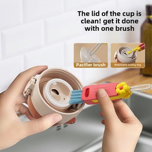 Cepillo limpiador multifuncional tres en uno de plástico PP para tapas de vasos, biberones y tazas de cocina. - Product Image 3