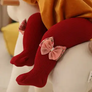 2021新款西班牙INS漂亮女孩公主碎花珍珠蝴蝶结美女七彩儿童婴儿紧身袜圣诞袜