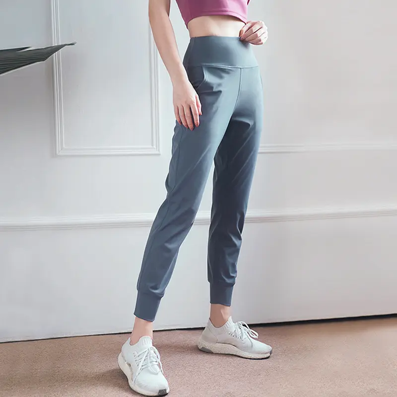 Vendita calda pantaloni sportivi con cintura elasticizzata da giorno veloce pantaloni larghi da donna da palestra per Jogger Yoga