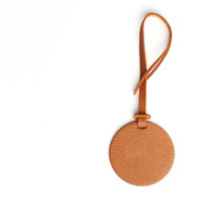 Étiquette de bagage ronde en cuir PU personnalisable, idéale pour valise, sac à main et accessoires – Nouvelle collection tendance pour femme