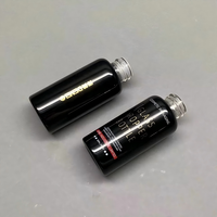 Vente en gros de flacons compte-gouttes en verre noir brillant de 30 ml avec compte-gouttes en bambou et impression sérigraphique pour les gouttes pour les yeux et les sérums pour le soin de la peau