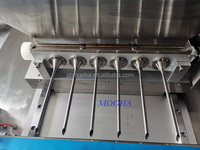 Machine de dépose de pâte à croissants, gaufres, cupcakes, pâtisseries, et de garniture pour gâteaux et rouleaux aux œufs, avec alimentation par piston et contrôle servo