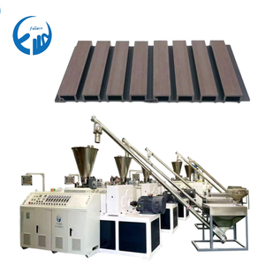 Ligne d'extrusion de profilés de panneaux de porte WPC entièrement automatique, machine de fabrication de panneaux de porte en composite bois-plastique personnalisée - Product Image 1