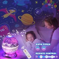 Projecteur d'étoiles Galaxy Night Light avec 12 films de projection, lumières de dinosaures pour enfants à changement de couleur pour adultes et enfants Cadeaux