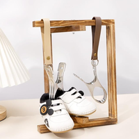 Clips à chaussures en cuir PU très populaires, clips pour poussette, crochet portable pour chaussures de bébé, crochets suspendus sur les poussettes