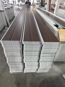 Panneaux de <span class=keywords><strong>plafond</strong></span> et de mur en PVC à grain de bois à bas <span class=keywords><strong>prix</strong></span> populaires en Chine - Product Image 5