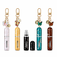 Atomiseur de parfum rechargeable avec breloque papillon, motif lune et étoile, flacon vaporisateur de voyage portable avec pendentif papillon