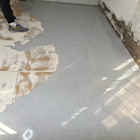 Peinture de sol époxy auto-nivelante PURCOAT à effet sable coloré, application au truelle, haute brillance, haute durabilité, effet marbre