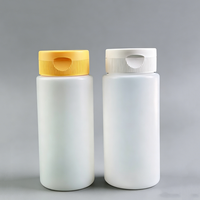 Bouteilles en PEHD de 300 ml en forme de cylindre vide, pour remplissage à chaud, avec bouchon à clapet souple pour sauce chocolatée, couleur personnalisée, 10 oz