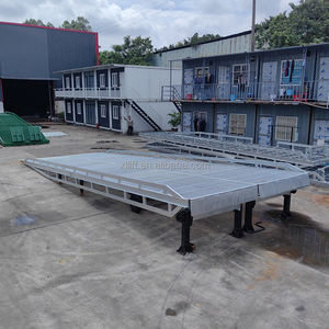 Puente de embarque de rampa de muelle de elevación de carga hidráulica famosa de China en venta plataforma elevadora - Product Image 1