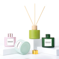 Bouteille diffuseur à roseaux en verre rose ronde de 100 ml avec couvercle pour parfum d'ambiance, emballage en gros