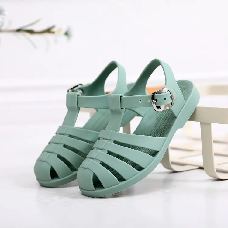 Sepatu jeli matahari Sandal klasik gaya Roma sepatu karet Sandal pantai dengan sol lembut tali gesper sepatu klasik
