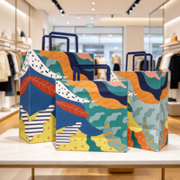 Sac en papier kraft coloré de haute qualité, recyclable, avec poignée en corde plate, pour vêtements et cadeaux