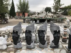 Statue de femme nue sculptée à la main, fontaine d'eau en pierre pour femmes