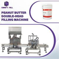 Dubbelkopige pasta-vulmachine, pindakaasvuller en afsluitapparatuur voor de verpakkingsinstallatie van notenbotervaten