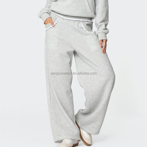 <span class=keywords><strong>Pantaloni</strong></span> <span class=keywords><strong>Larghi</strong></span> Grigi all'Ingrosso, Joggers da Donna <span class=keywords><strong>con</strong></span> Dettagli in Pizzo e Volant - Product Image 1