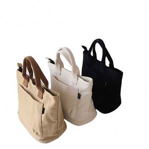 Bolsa de Compras Reutilizable de Algodón Ecológico con Logotipo Impreso Personalizado de Alta Calidad, con Bolsillo y Patrón de Letras - Product Image 1