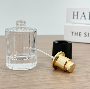 Botella de vidrio de <span class=keywords><strong>Perfume</strong></span> en aerosol de lujo 50ml 100mL Cilindro transparente de rayas verticales <span class=keywords><strong>Spray</strong></span> Embalaje de <span class=keywords><strong>perfume</strong></span> vacío - Product Image 3