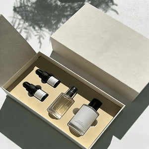 Boîte de luxe personnalisée avec couvercle et base pour l'emballage d'huiles corporelles et capillaires, en carton rigide avec insert EVA découpé, vente en gros - Product Image 1