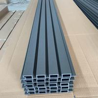 Revêtement mural en composite bois-plastique (WPC) co-extrudé de 2e génération, résistant au vent et à l'humidité, à rainures, pour application murale.